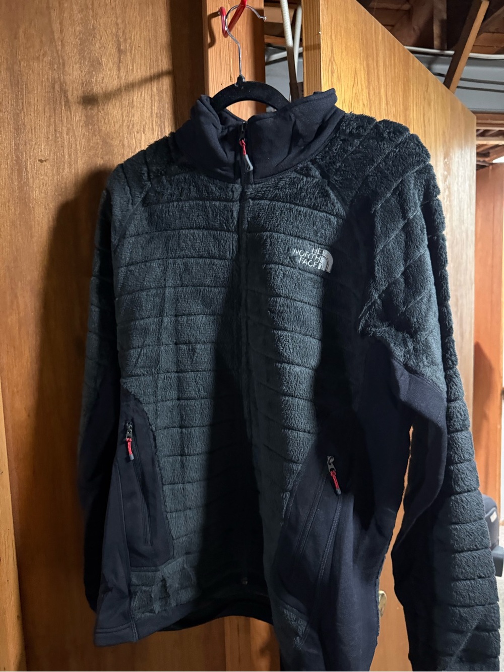 The North Face Black Men's Textured Fleece Jacket with Red Zipper Pulls
